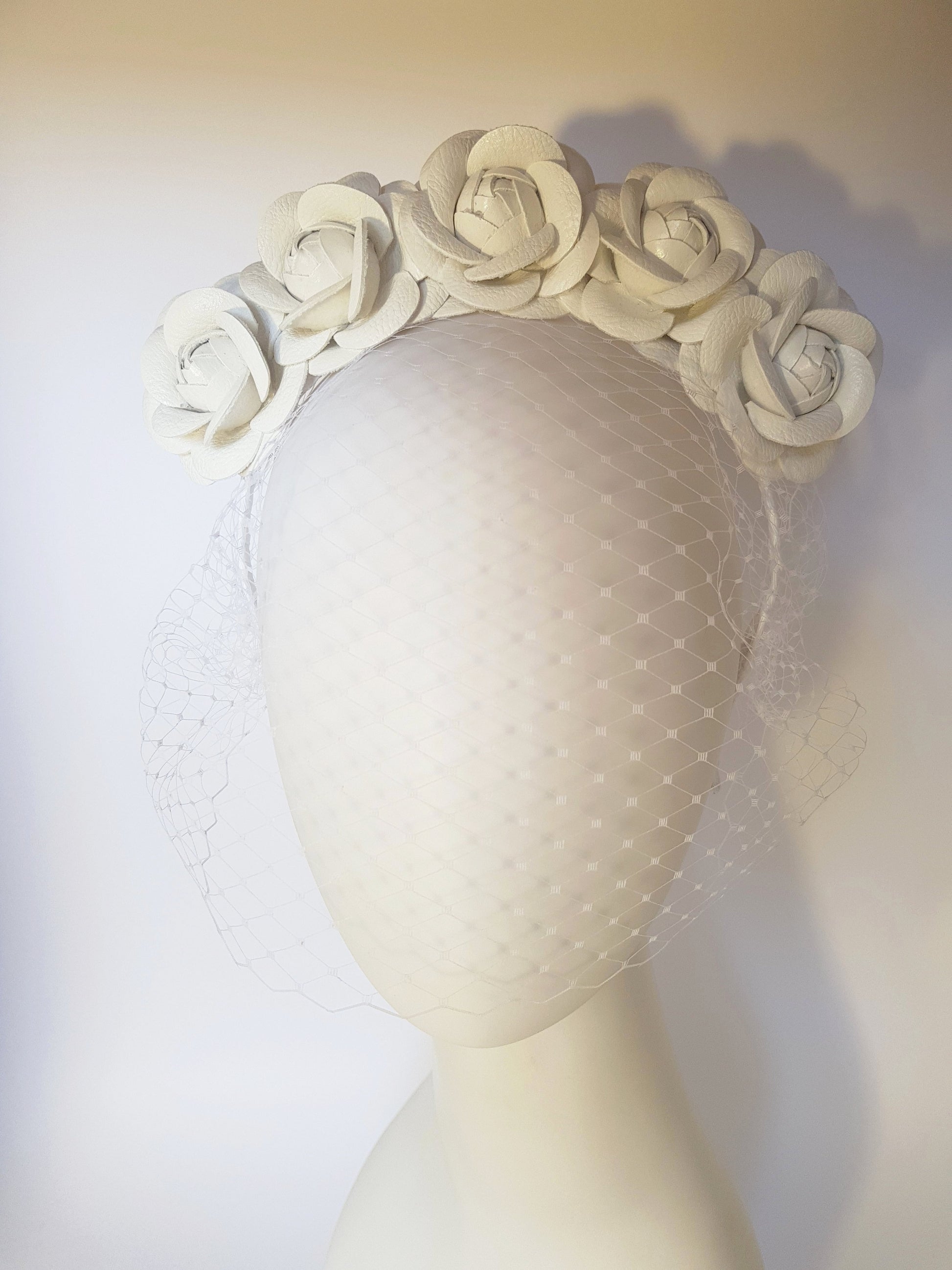 white floral net headpieces