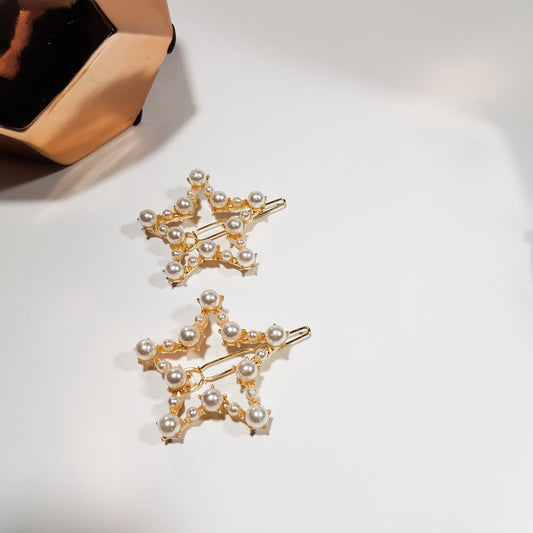 Gold pearl star hair clips